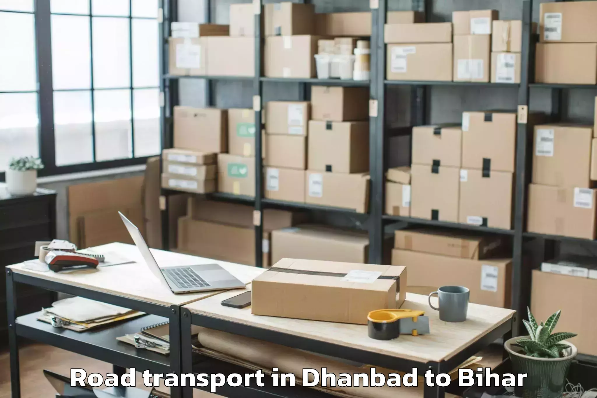 Easy Dhanbad to Ghanshampur Road Transport Booking